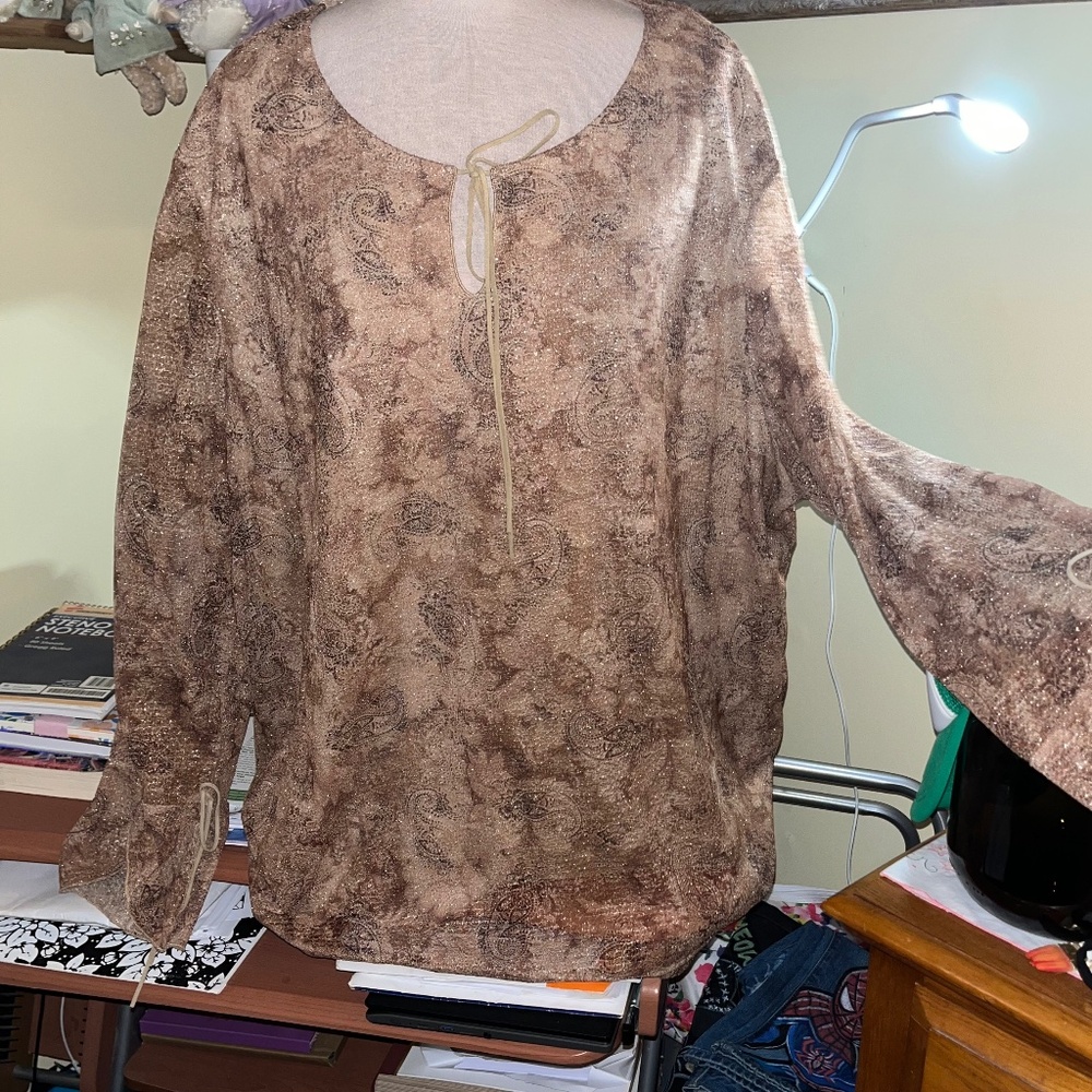 Boho inspired paisley print cream, tan and amberish colors with shimmering hues